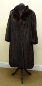 Dark Mink full length coat, mandarin collar, slit pockets and hook fastenings,