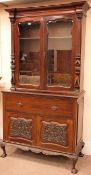 Late Victorian mahogany break front secretaire bookcase on cupboard, projecting cornice,
