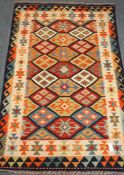 Chohi Kilim vegetable dye blue and beige ground wool rug, geometric pattern field,
