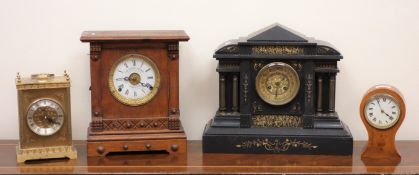 Victorian architectural black slate mantel clock, half hour striking on a coil,