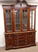 Georgian style mahogany breakfront bookcase, carved and pierced swan neck pediment,