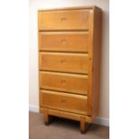 Mid 20th century light oak cabinet, five up and over doors enclosing fitted interior,