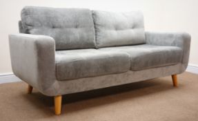 Three seat sofa upholstered in grey fabric,