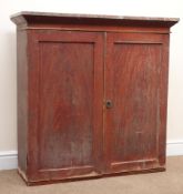 Early 20th century stained pine cupboard, marble top, two doors enclosing two shelves, W102cm,