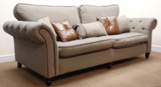 Grande sofa upholstered in deep buttoned grey linen fabric with piping, cushion back,