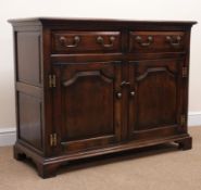 18th century style oak dresser, two drawers above two cupboard doors, shaped bracket supports,