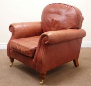 Parker Knoll Westbury armchair, upholstered in a dark tan leather,