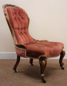 Victorian mahogany framed nursing chair, upholstered in a deep buttoned fabric, cabriole legs,