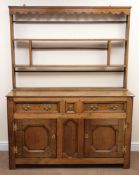 Early 19th century oak dresser with raised two tier palate rack above two long and one short drawer,
