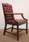 Georgian style mahogany desk armchair upholstered in oxblood buttoned leather,