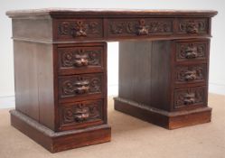 Victorian carved oak twin pedestal desk, inset leather top, lions head carved drawer handles,