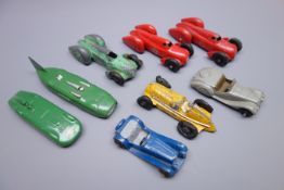 Dinky - eight unboxed and playworn early die-cast models including Gardner's MG Record Car,