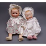 Two Armand Marseille 'My Dream Baby' bisque head dolls, each with moulded hair, sleeping eyes,
