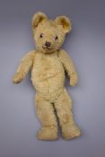 Early 20th century teddy bear, the plush covered body with squeaker mechanism,