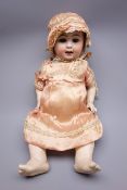 German bisque head doll with applied hair, sleeping eyes, open mouth with teeth and tongue,