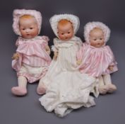 Three Armand Marseille 'My Dream Baby' bisque head dolls, each with moulded hair,