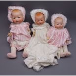 Three Armand Marseille 'My Dream Baby' bisque head dolls, each with moulded hair,