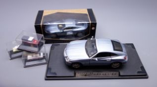 Motor Max large scale die-cast showroom display model of a Chrysler Crossfire on titled plastic