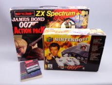 Two James Bond related computer games consoles - Nintendo 64 Goldeneye and Sinclair ZX Spectrum+2