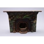 Victorian doll's house or traveller's sample cast-iron fire surround with painted marble finish and