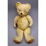 1940s large plush covered teddy bear with applied eyes, stitched nose and mouth, revolving head,
