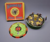 'The Victory' die-cast metal horse racing game of drum shaped form with revolving paper covered