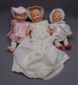 Three Armand Marseille 'My Dream Baby' bisque head dolls, each with moulded hair, sleeping eyes,