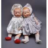 Two Armand Marseille 'My Dream Baby' bisque head dolls, each with moulded hair, sleeping eyes,