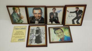 Six framed photographs of actors who have payed James Bond - David Niven, George Lazenby,