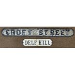 Two Victorian black and white cast iron street signs;