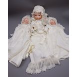 Three Armand Marseille 'My Dream Baby' bisque head dolls, each with moulded hair,