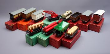 Hornby '0' gauge - twelve items of rolling stock comprising No.1 Cattle Truck, LMS Hopper Wagon, No.