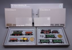 Marklin HO gauge - 1985 50th anniversary commemorative pack containing two individually boxed sets