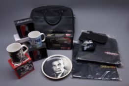 Quantity of James Bond memorabilia and promotional items including two polo shirts embroidered