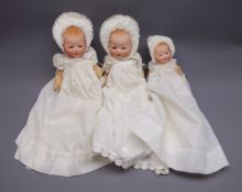 Three Armand Marseille 'My Dream Baby' bisque head dolls, each with moulded hair, sleeping eyes,