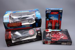 Two Nikko 1:16th scale James Bond radio controlled die-cast model cars - Aston Martin DBS from