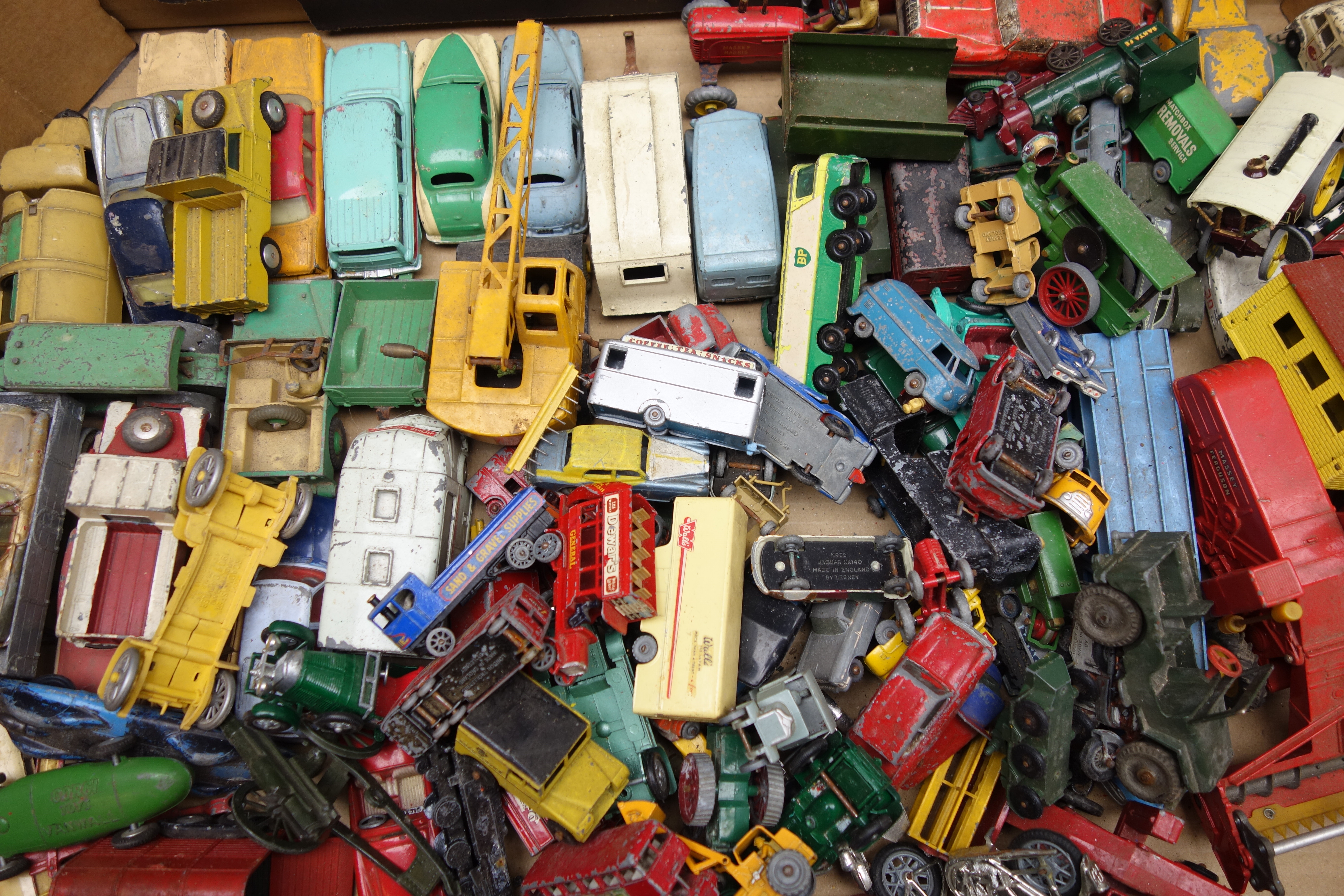 Large quantity of unboxed and playworn die-cast models including early Dinky,