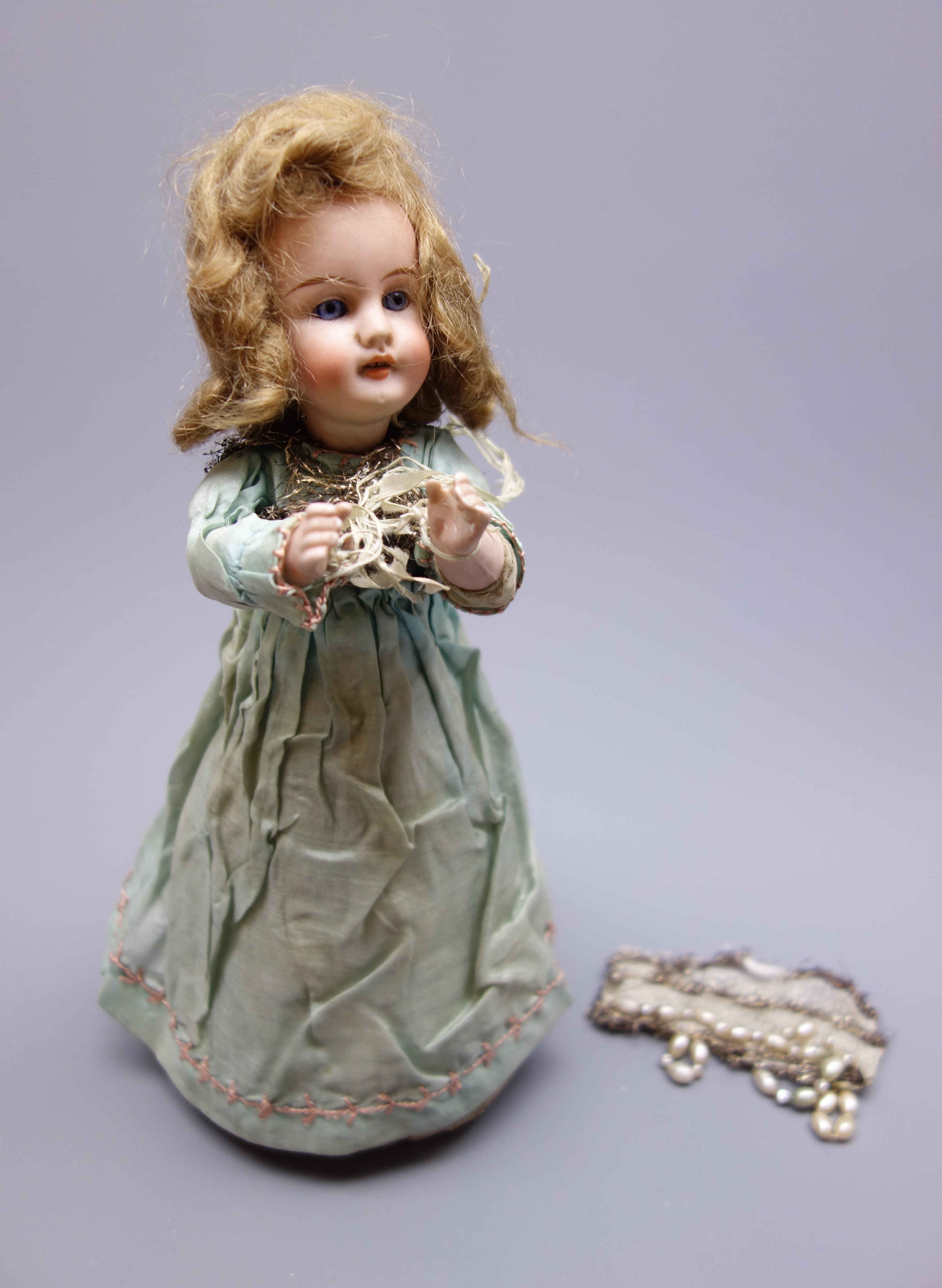 Early 20th century French Henri Rostal Mon Tresor bisque head musical pull-along doll,