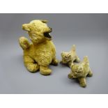 Plush covered seated dog with straw filled body and felt lined open mouth H28cm and two smaller