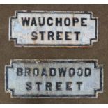 Two Victorian black and white cast iron street signs;