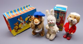 1960s Alps Japan clockwork tin-plate and plush covered 'Strutting Animal' figure with twirling cane