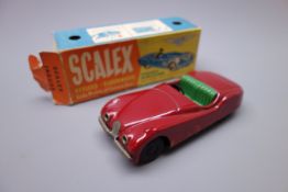 Minimodels Scalex keyless clockwork tin-plate model of a Jaguar XK120 racing car, in maroon, L13cm,