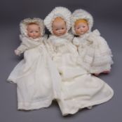 Three Armand Marseille 'My Dream Baby' bisque head dolls, each with moulded hair,