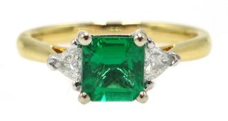 18ct white gold emerald cut emerald and trillion cut diamond three stone ring, hallmarked,