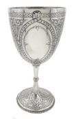 Silver goblet embossed decoration by Fenton Brothers, Sheffield 1874, approx 9.