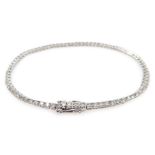 White gold round brilliant cut diamond line bracelet stamped 18K, diamond total weight 2.