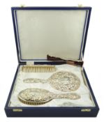 Four piece silver dressing table set,