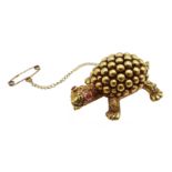 18ct gold tortoise brooch with ruby eyes by Hans Georg Mautner,