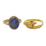 18ct gold (tested) stone set serpent ring and a 9ct gold oval opal doublet ring,