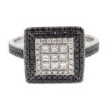 18ct white gold round brilliant cut and princess cut black and white diamond ring,